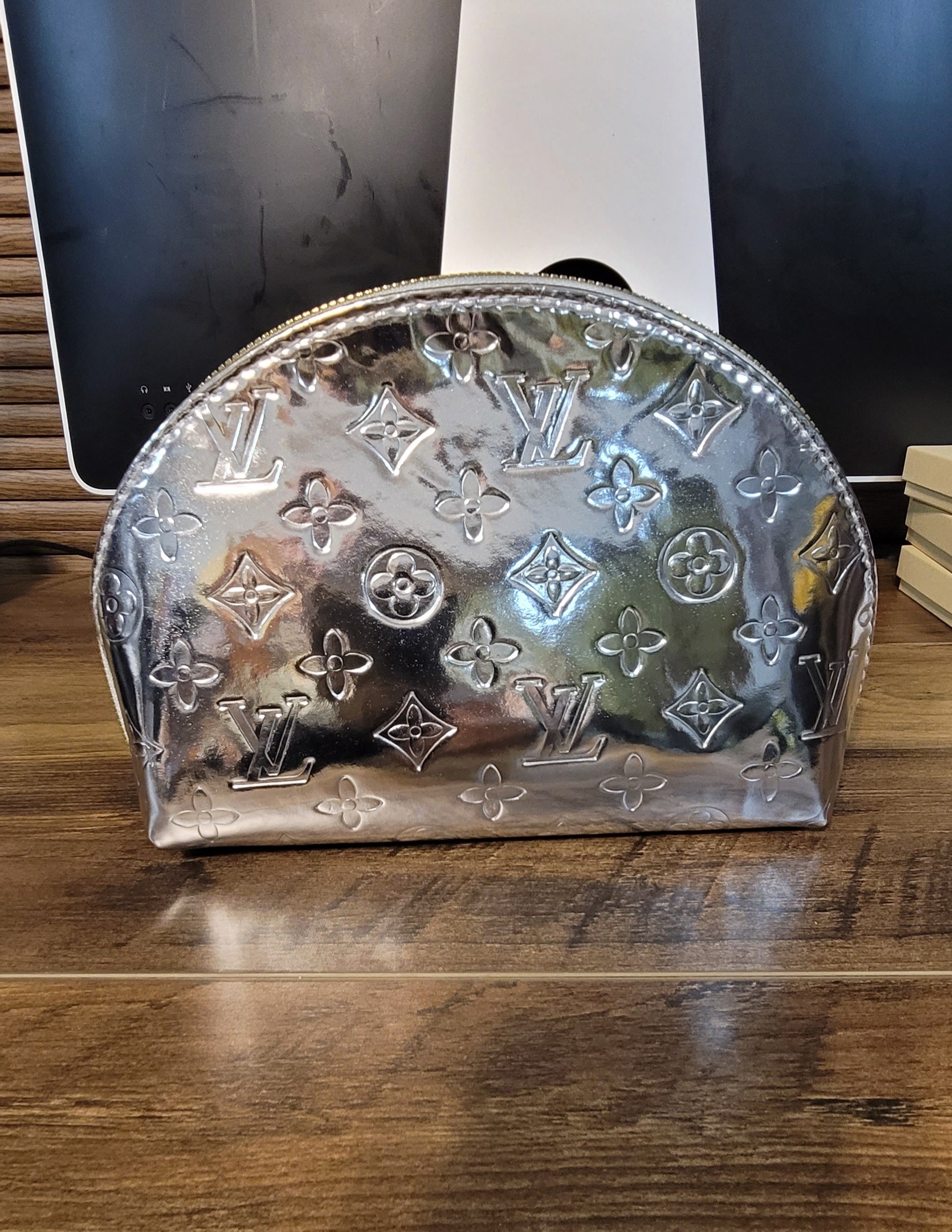 Silver Embossed 4pc Cosmetic Purse.
